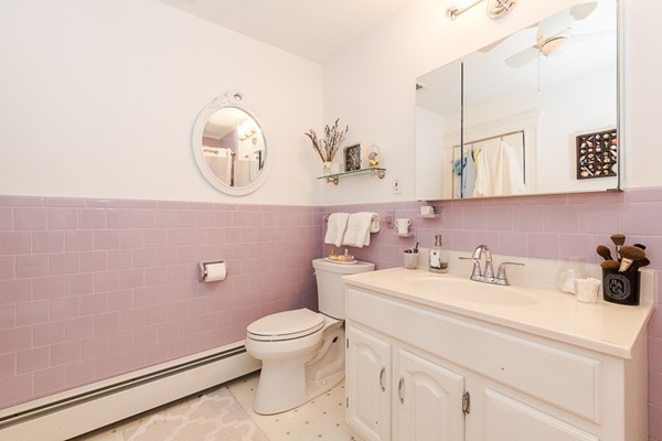 52 Aberdeen Road Arlington, MA 02476 - Photo 23 of 30 a bathroom with a toilet sink and mirror