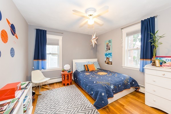 52 Aberdeen Road Arlington, MA 02476 - Photo 24 of 30 a bedroom with a bed and a dresser in it