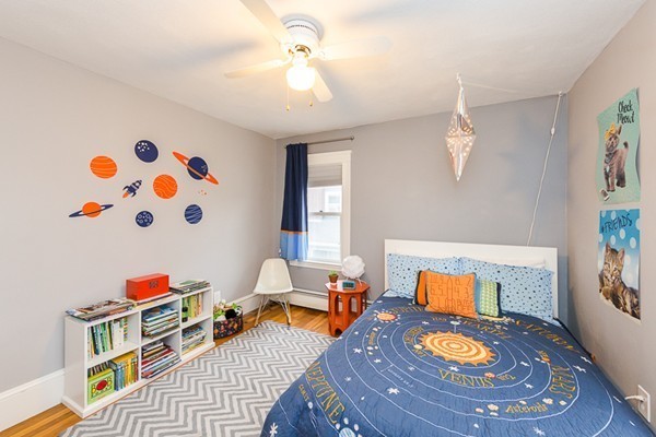 52 Aberdeen Road Arlington, MA 02476 - Photo 25 of 30 a living room with furniture and wooden floor