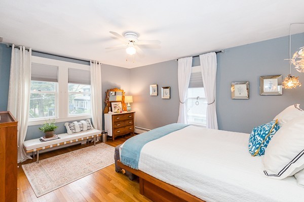 52 Aberdeen Road Arlington, MA 02476 - Photo 26 of 30 a spacious bedroom with a bed table flowerpot and window