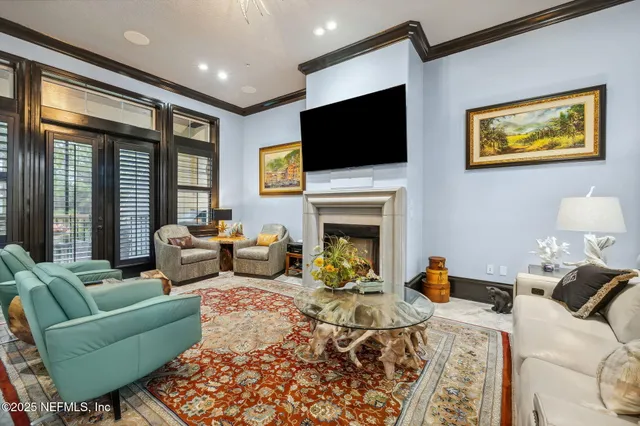 a kitchen with stainless steel appliances granite countertop a stove a sink and a wooden cabinets