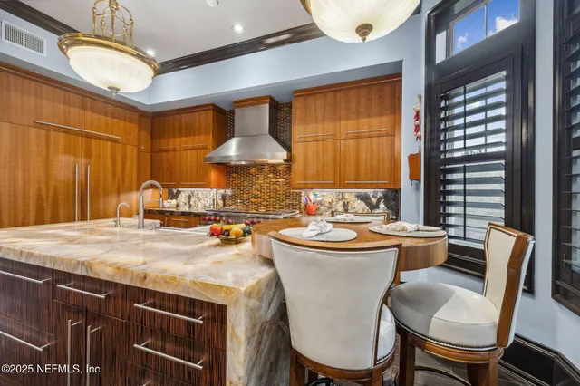 a view of a lake with a house in the background