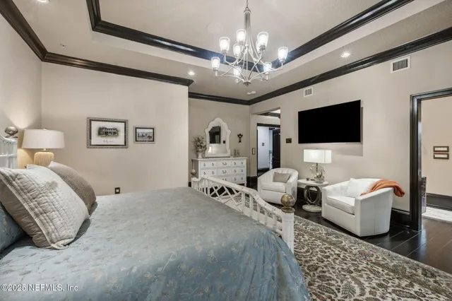 front view of a house with a tree