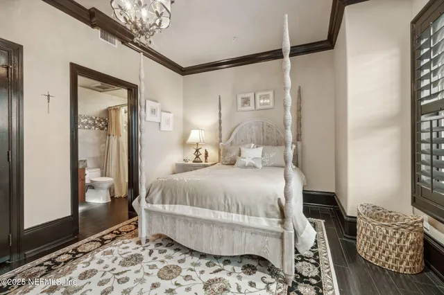 a view of a patio with table and chairs with wooden floor and fence