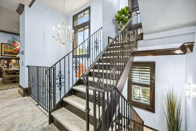a view of a park with large trees