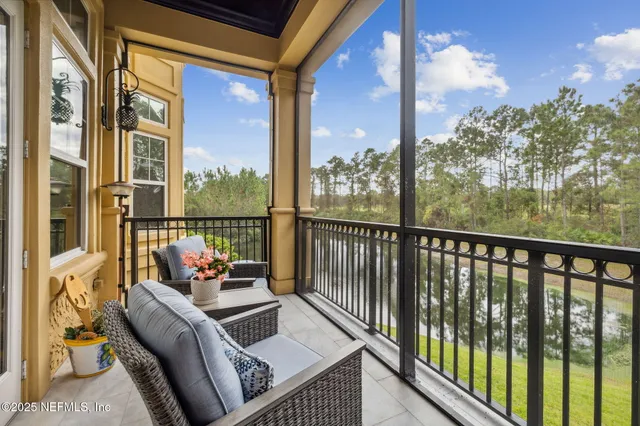 a front view of a house with a yard table and chairs