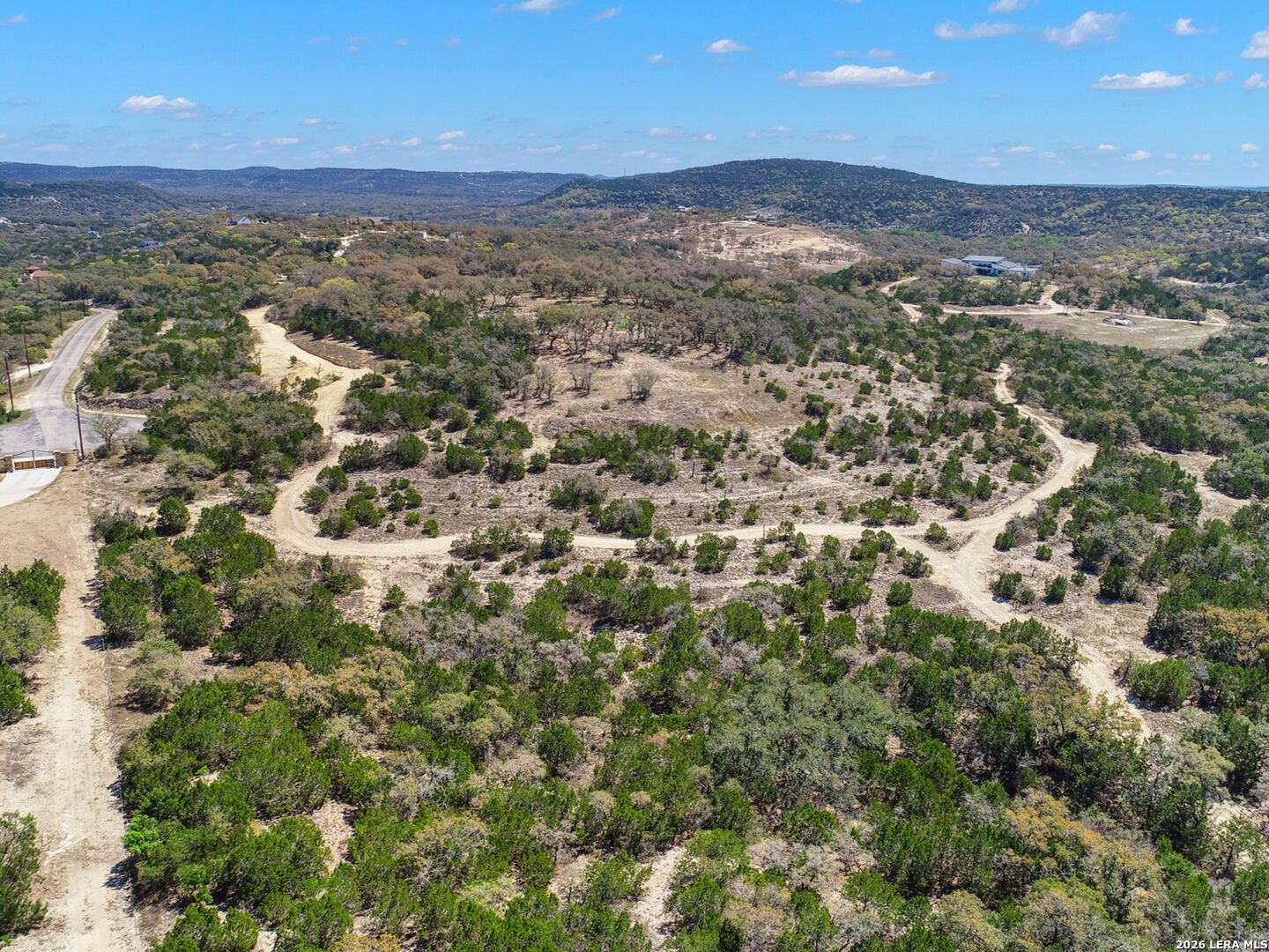 189 Table Rock Helotes, TX 78023 - Photo 83 of 91 an aerial view of residential houses with outdoor space and trees