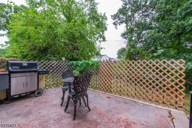 a table and chair in the patio