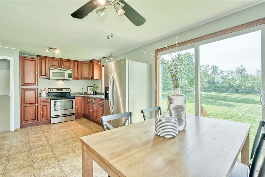 1815 Woodard Road Webster, NY 14580 - Photo 18 of 45 KITCHEN . . SLIDING GLASS DOOR