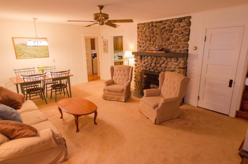 110 Snug Harbor Road Belgrade, ME 04917 - Photo 16 of 18 Coy living and dining area just...
