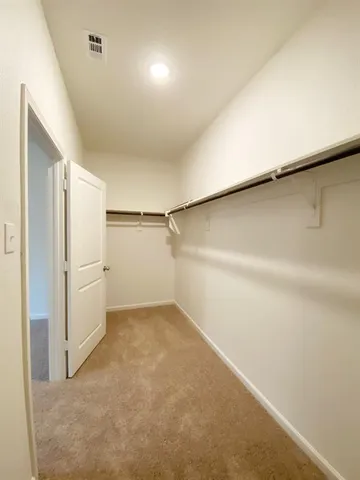 an empty room with an entryway