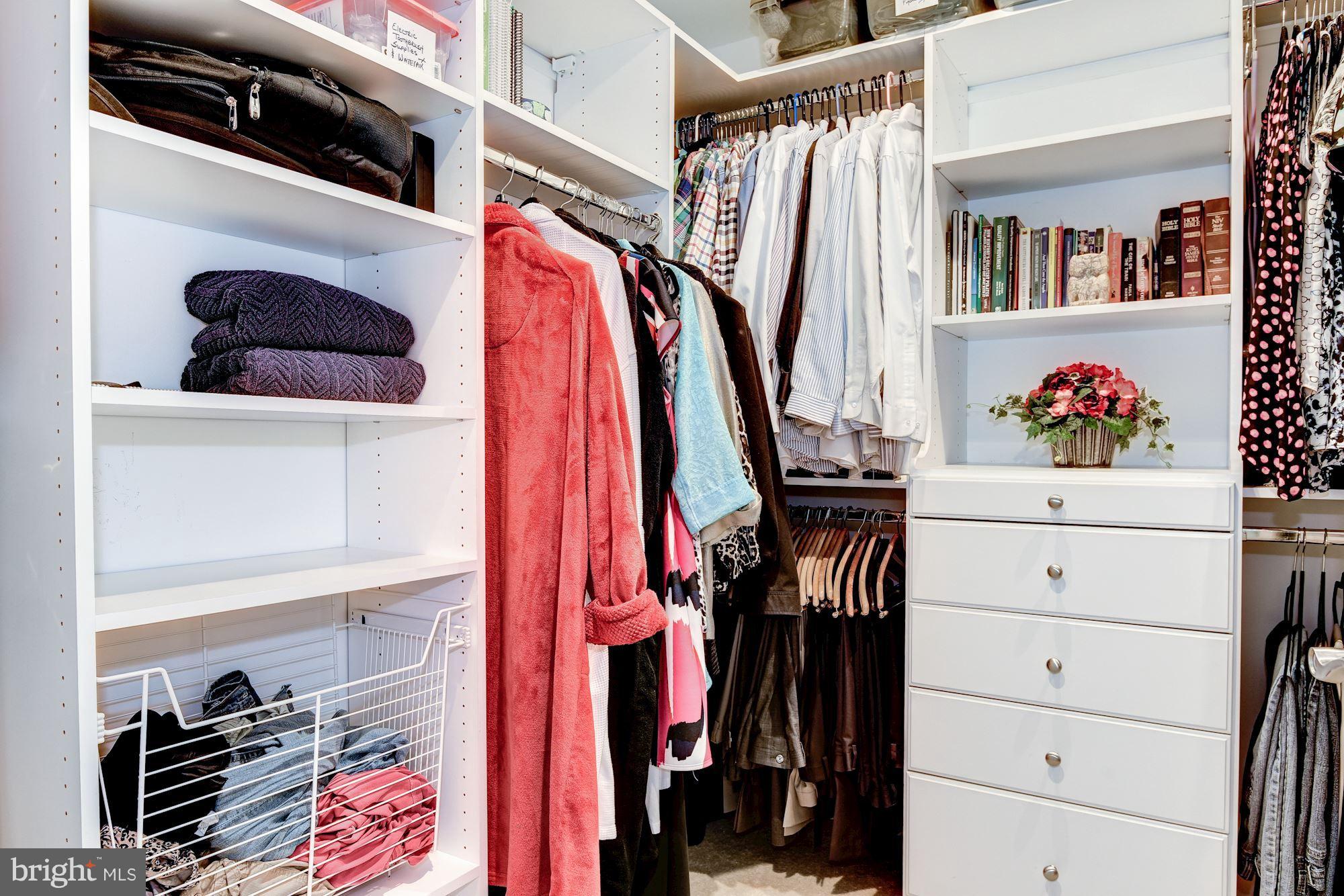 3600 South Glebe Road, Unit 918W Arlington, VA 22202 - Photo 15 of 30 a view of walk in closet with clothes and shoes