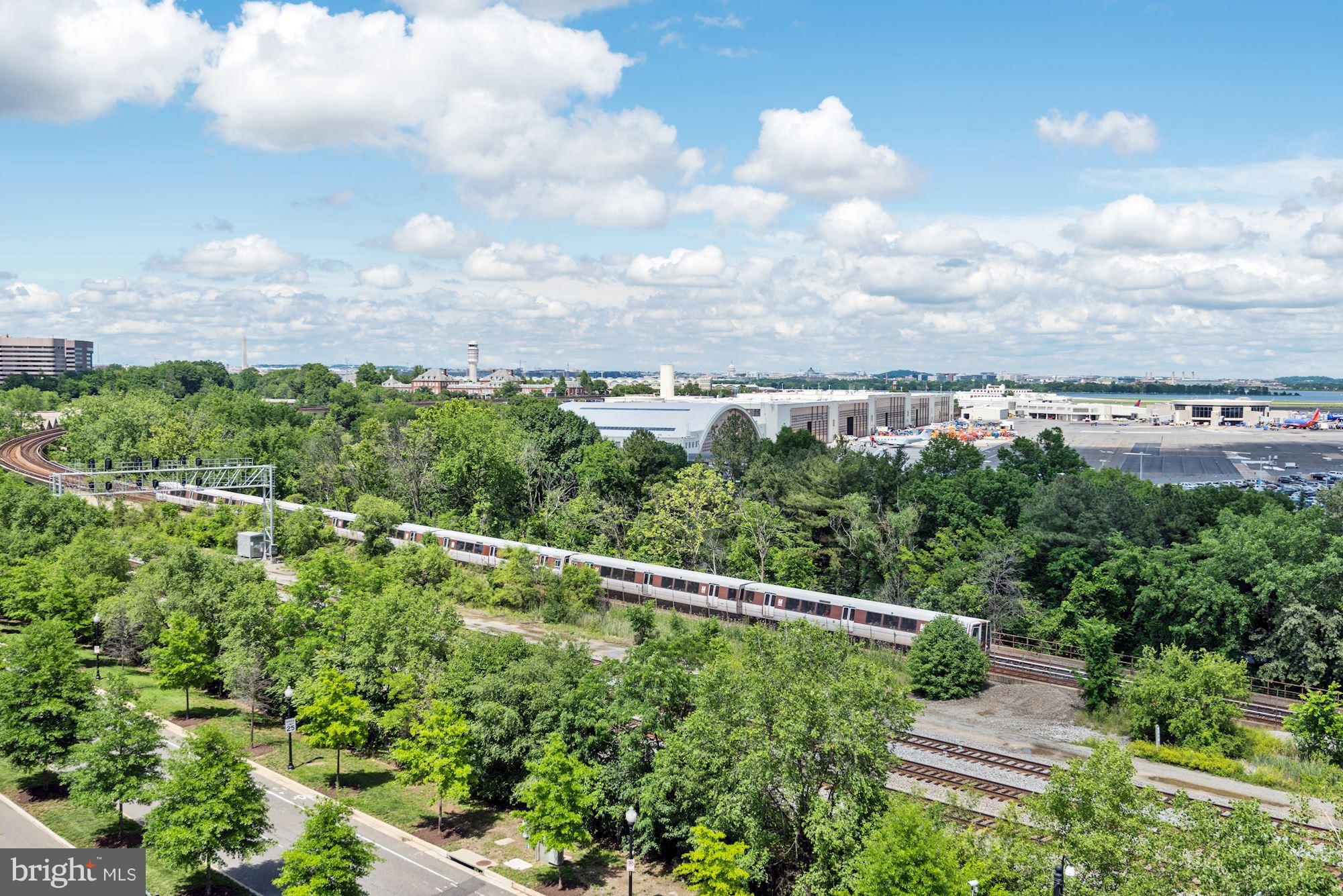 3600 South Glebe Road, Unit 918W Arlington, VA 22202 - Photo 29 of 30 a view of a city with lush green forest