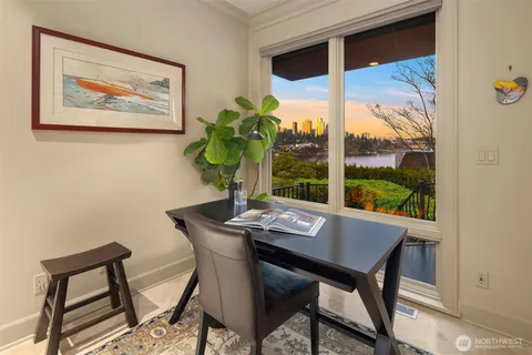 a view of a dining room with furniture window and outside view