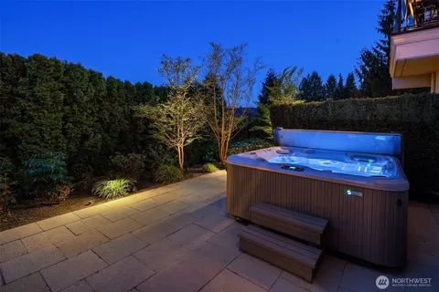 a view of outdoor sitting area with trees in the background