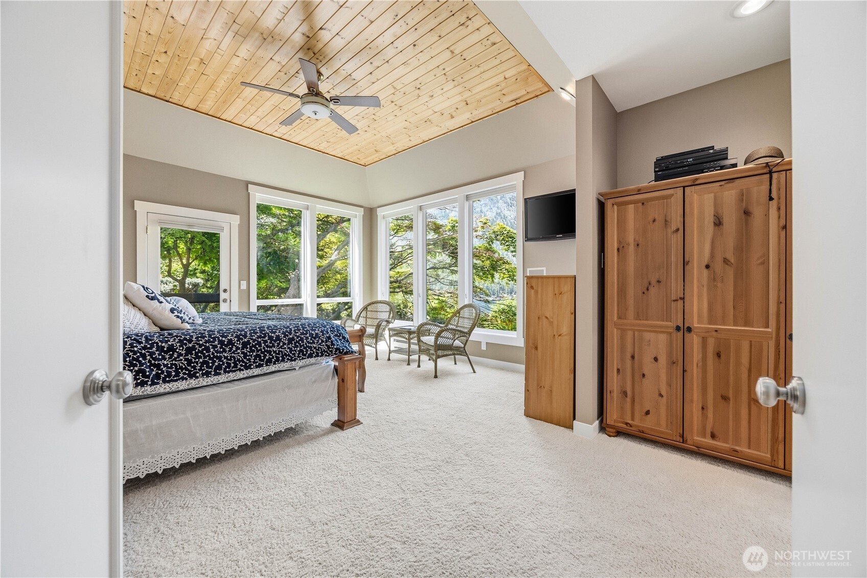 141 Sunset Place Manson, WA 98831 - Photo 15 of 38 a living room with furniture and a large window