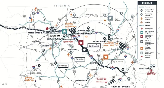 an aerial view of a house with a ocean view