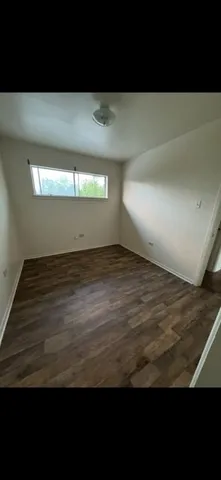 a bathroom with a bathtub and a sink
