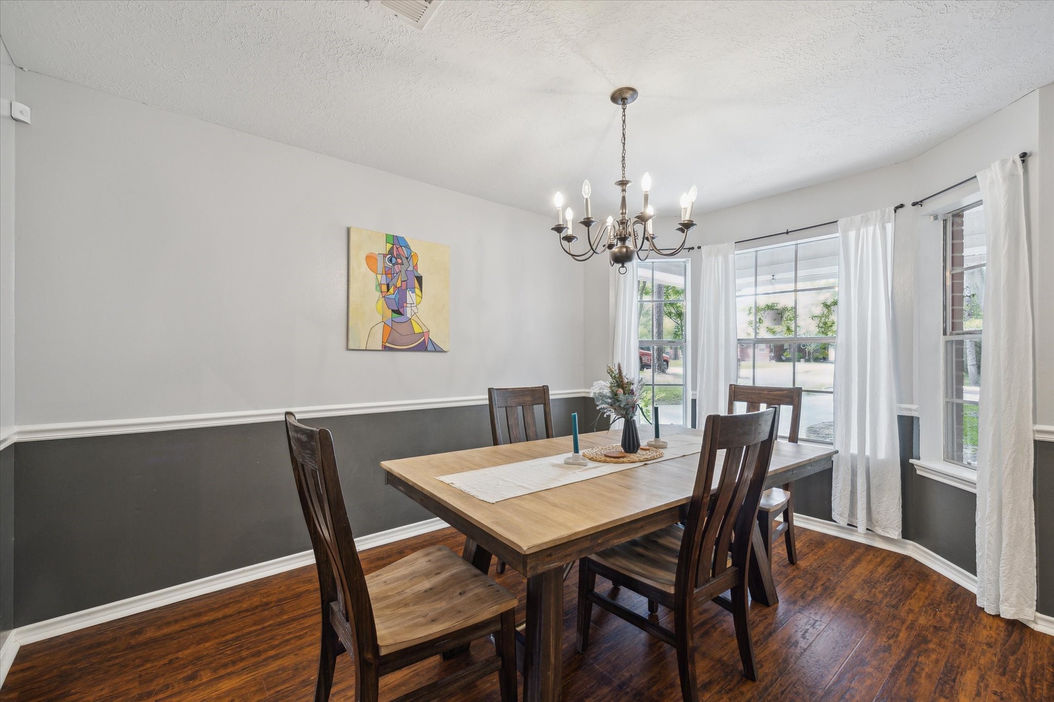2420 Canter Lane Conroe, TX 77384 - Photo 5 of 24 a view of a dining room with furniture window and wooden floor