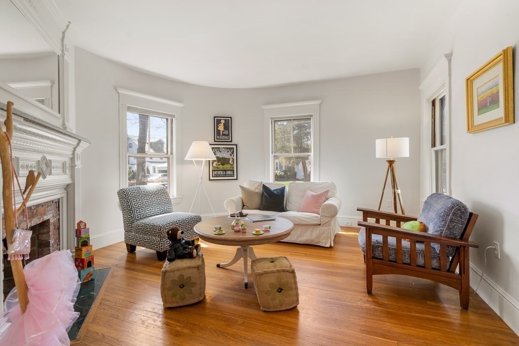 19 Elmore Street Newton, MA 02459 - Photo 18 of 40 a living room with furniture and wooden floor