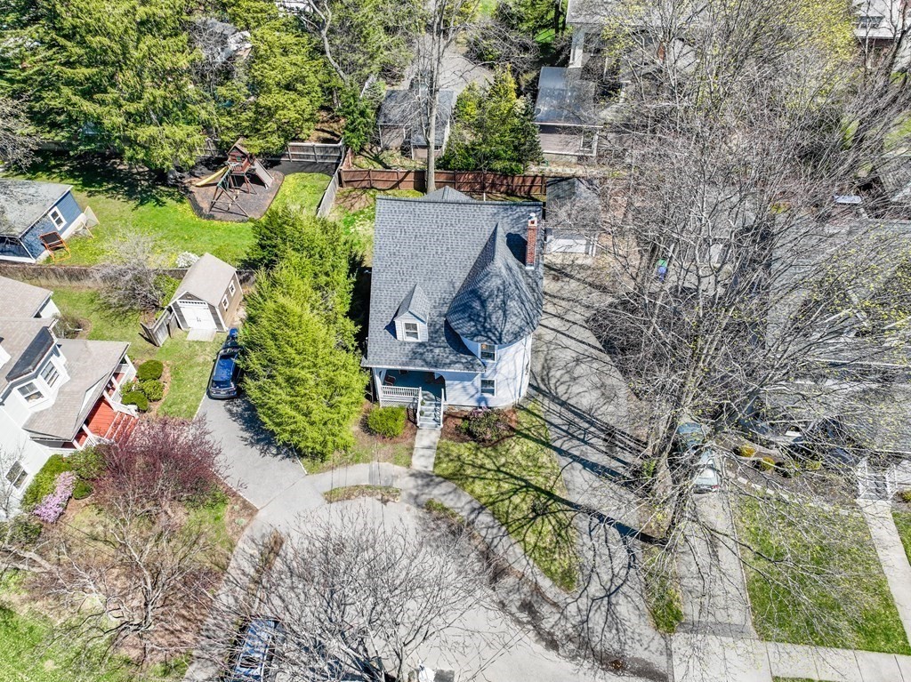 19 Elmore Street Newton, MA 02459 - Photo 37 of 40 an aerial view of a house with a yard