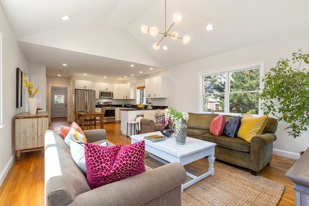 19 Elmore Street Newton, MA 02459 - Photo 6 of 40 a living room with furniture kitchen view and a large window