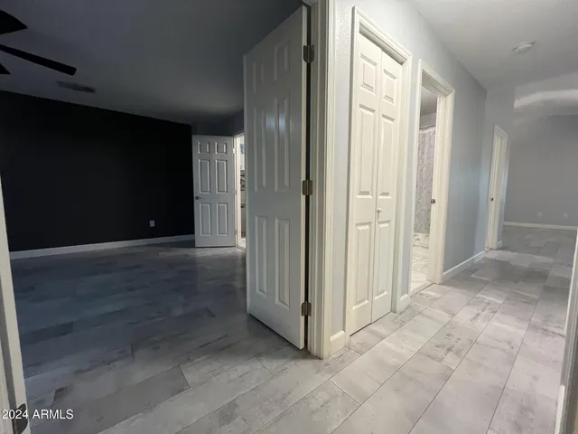 a view of entryway with wooden floor