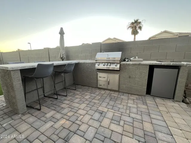 a view of a terrace with chairs