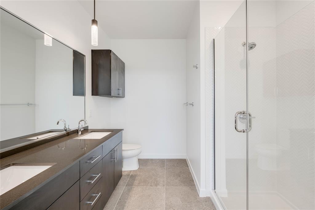 4801 Springdale Road, Unit 1307 Austin, TX 78723 - Photo 12 of 30 a bathroom with a sink and mirror