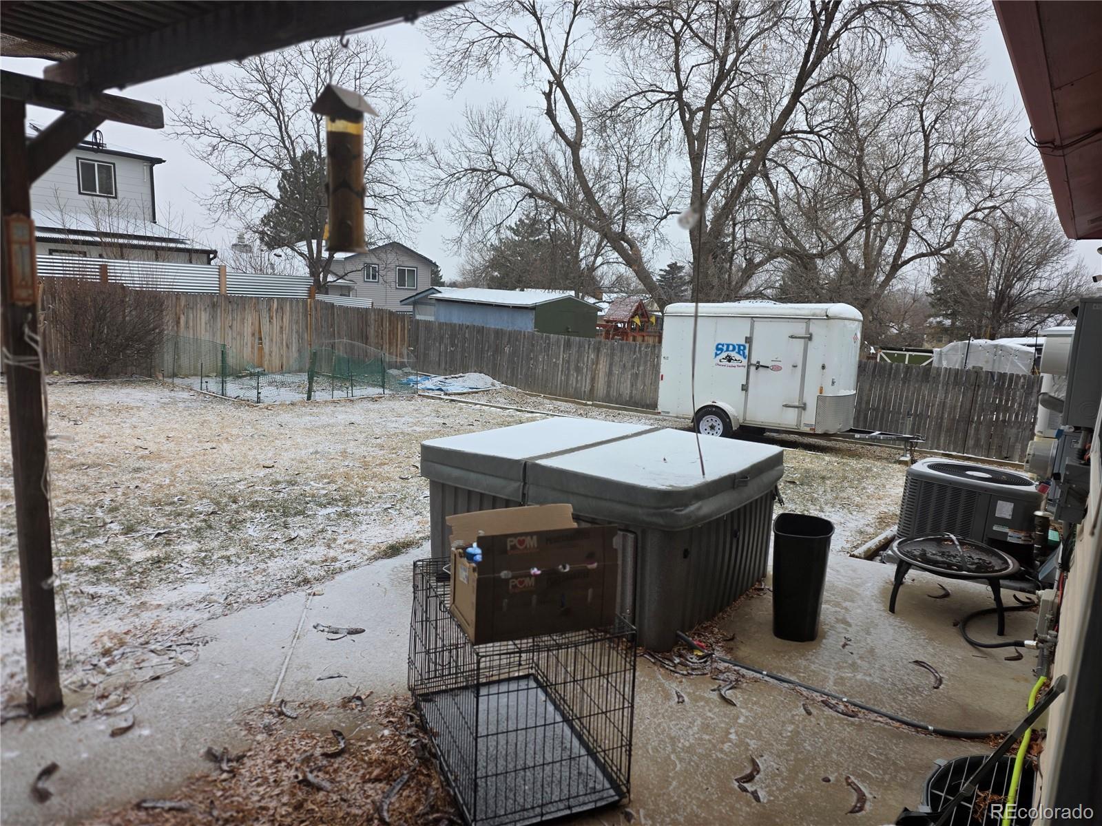 4472 South Cole Street Morrison, CO 80465 - Photo 3 of 3 a view of a house with backyard
