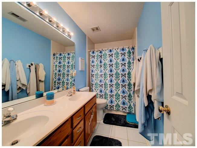 9812 Rockledge Drive Raleigh, NC 27617 - Photo 16 of 25 Gallery Image 16