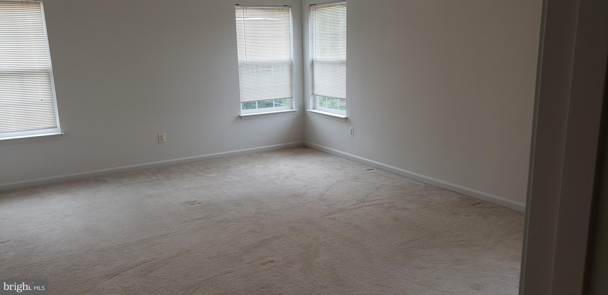 863 Fox Den Road Culpeper, VA 22701 - Photo 11 of 28 an empty room with windows