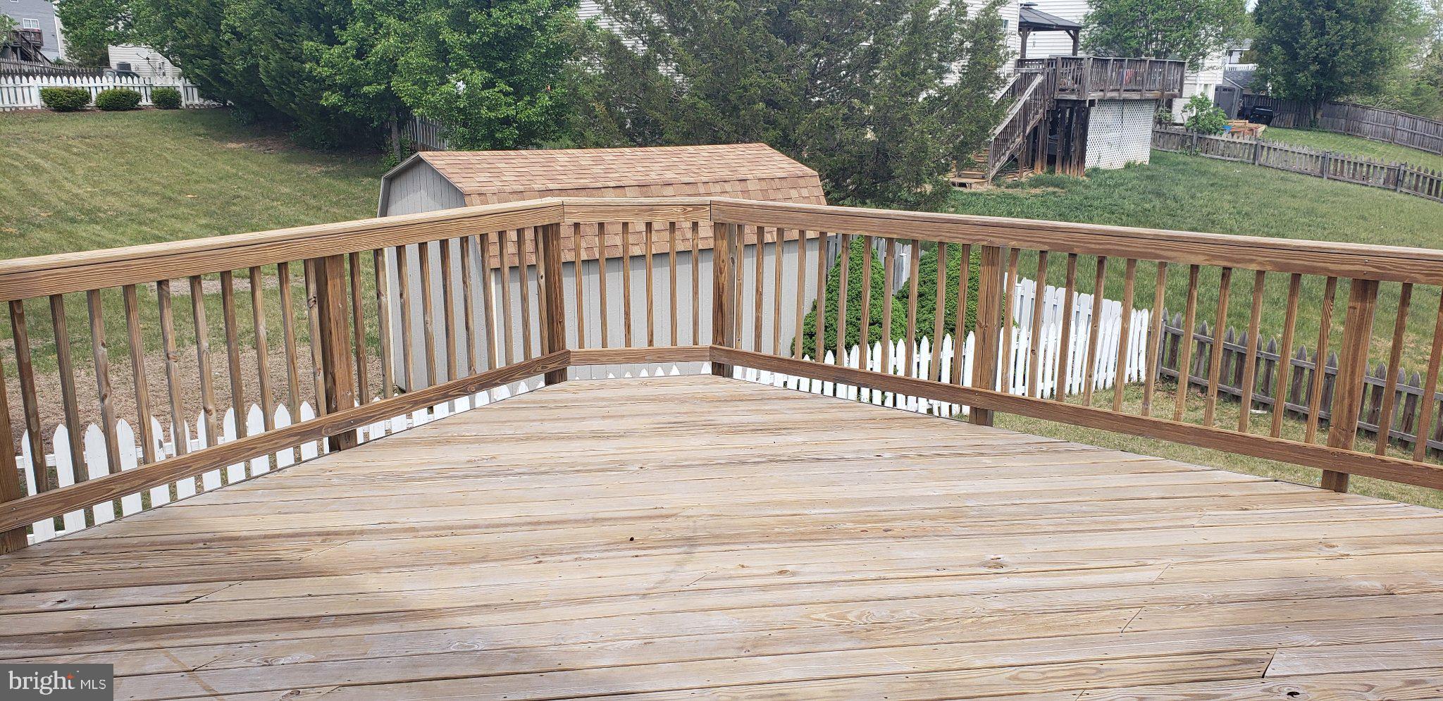 863 Fox Den Road Culpeper, VA 22701 - Photo 16 of 28 a view of a wooden deck