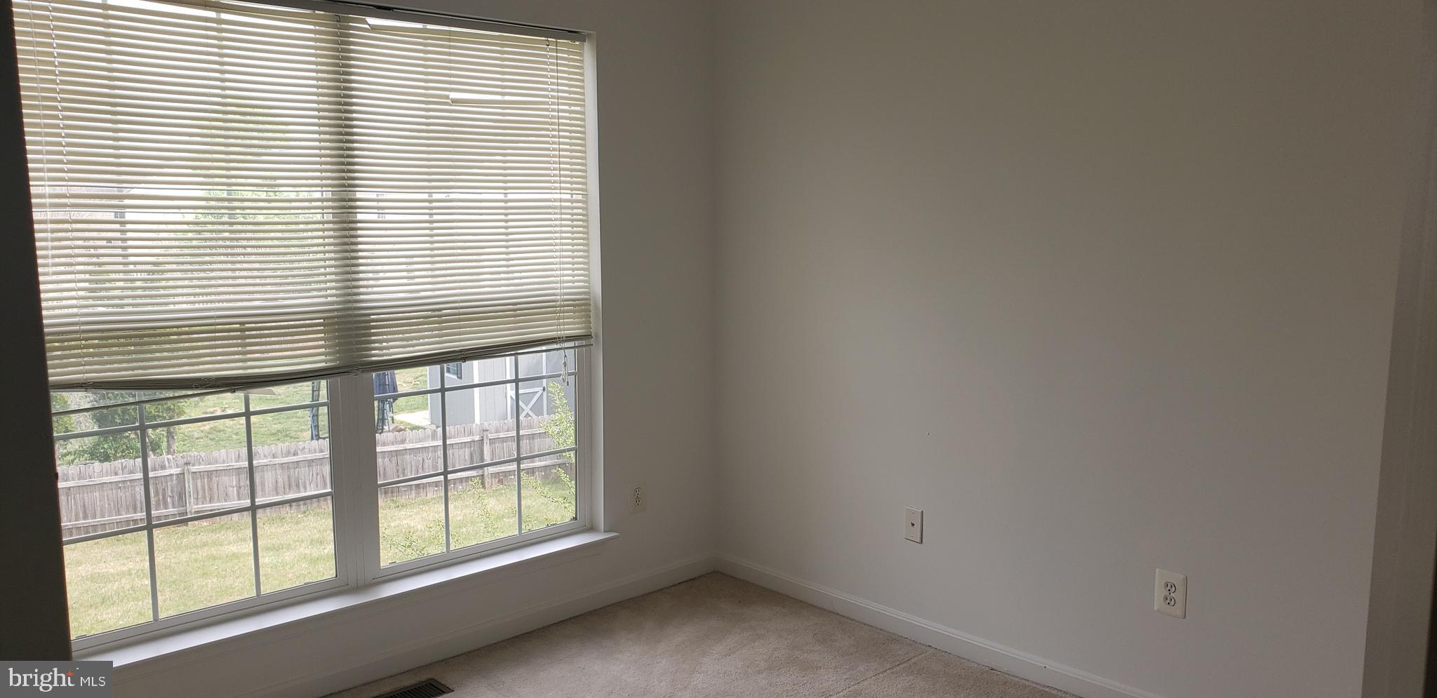 863 Fox Den Road Culpeper, VA 22701 - Photo 18 of 28 an empty room with a window