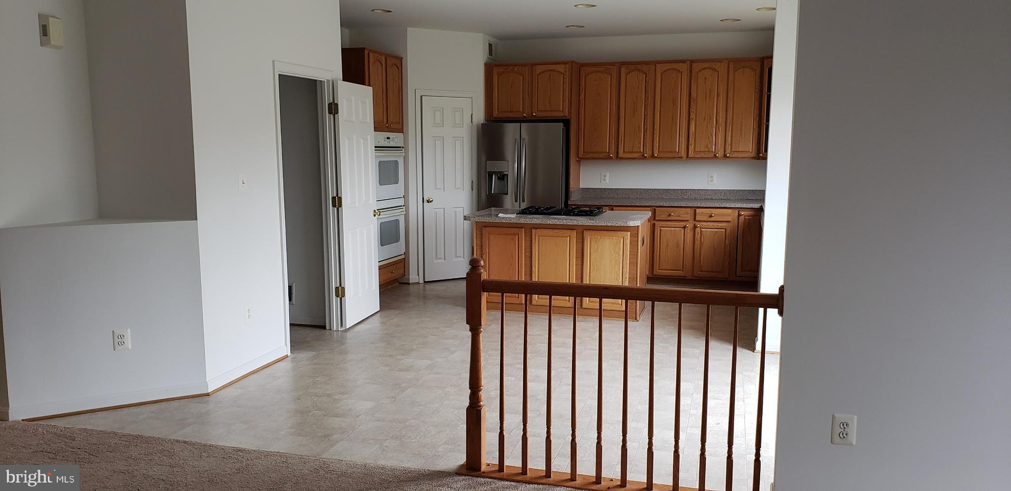 863 Fox Den Road Culpeper, VA 22701 - Photo 2 of 28 a view of a kitchen with electric appliances