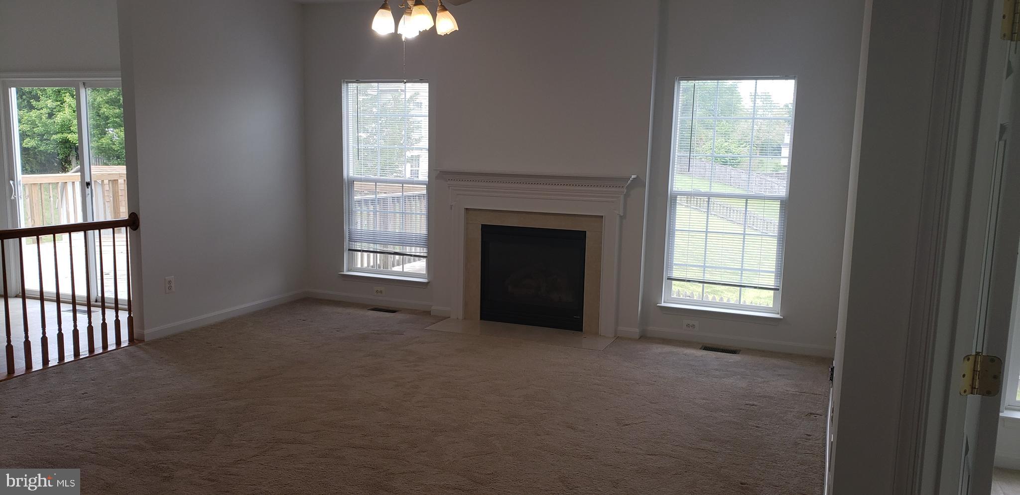 863 Fox Den Road Culpeper, VA 22701 - Photo 28 of 28 an empty room with windows