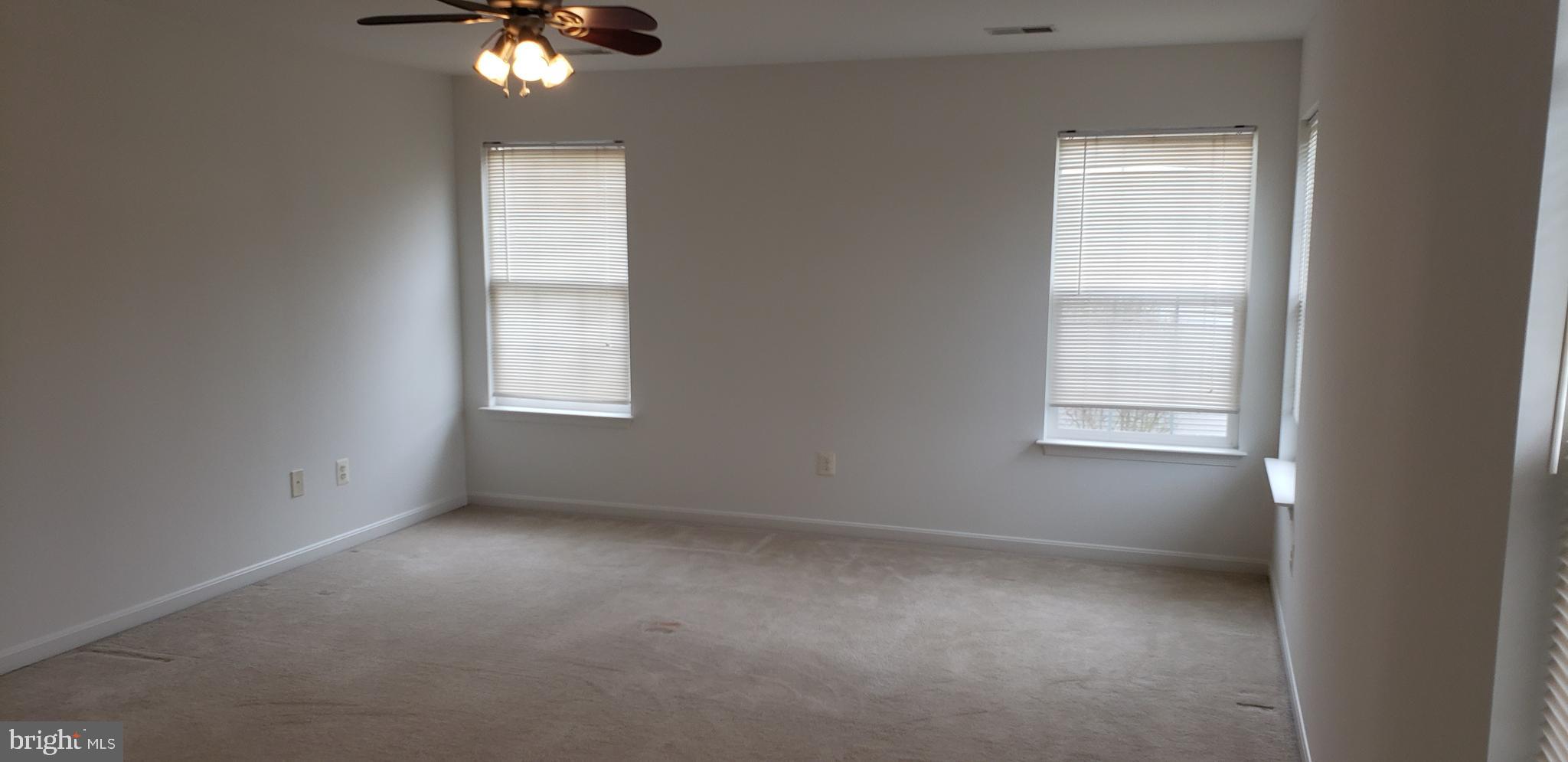863 Fox Den Road Culpeper, VA 22701 - Photo 5 of 28 an empty room with a window