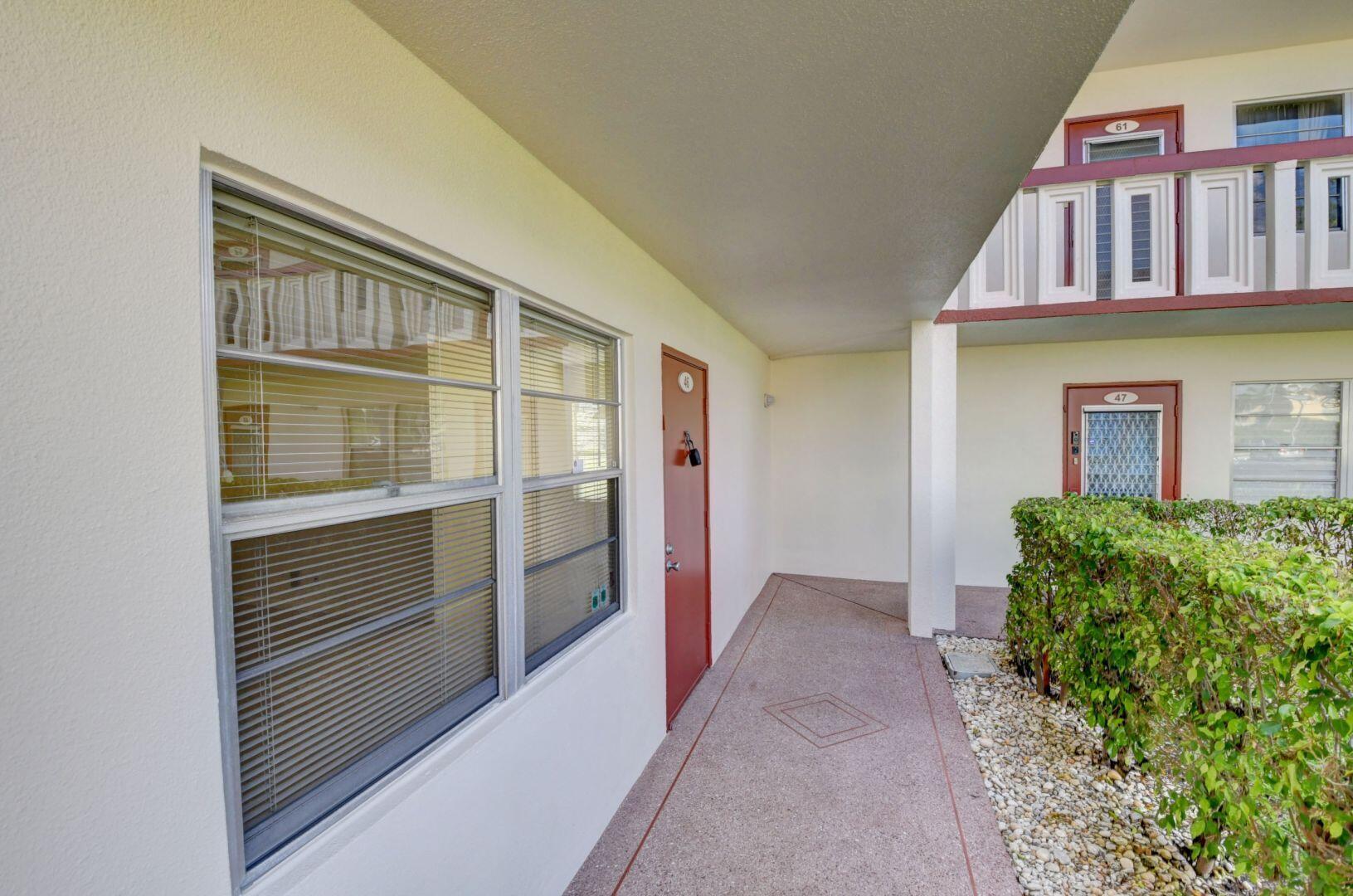 46 Brighton B Boca Raton, FL 33434 - Photo 2 of 50 a view of front door of house
