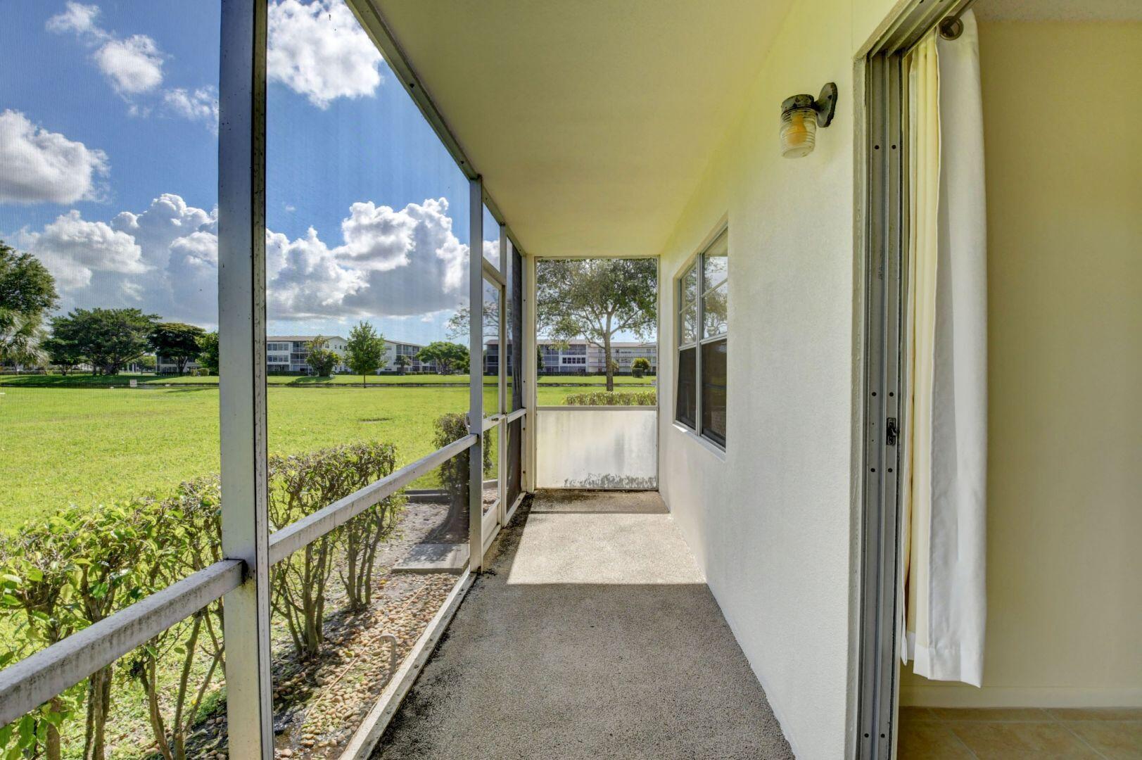 46 Brighton B Boca Raton, FL 33434 - Photo 22 of 50 a view of a balcony with lake view