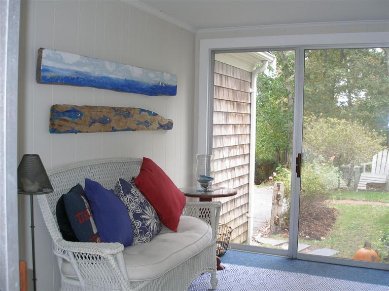 14 Paddock Pond Road Harwich, MA 02645 - Photo 11 of 28 a living room with furniture and a floor to ceiling window
