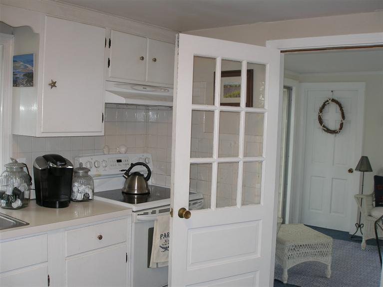 14 Paddock Pond Road Harwich, MA 02645 - Photo 15 of 28 a kitchen with a sink and cabinets