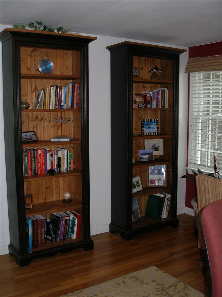 14 Paddock Pond Road Harwich, MA 02645 - Photo 17 of 28 a view of living room with wooden floor and book shelf