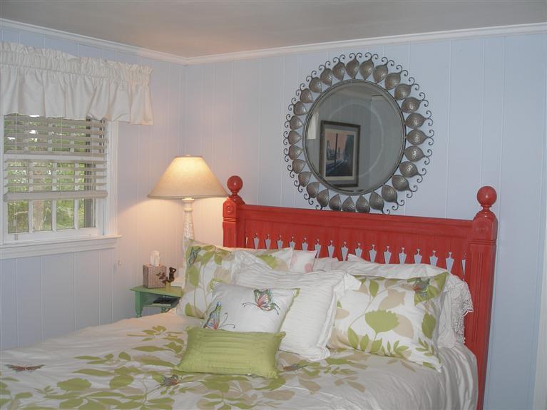 14 Paddock Pond Road Harwich, MA 02645 - Photo 20 of 28 a bed with a bed and a window