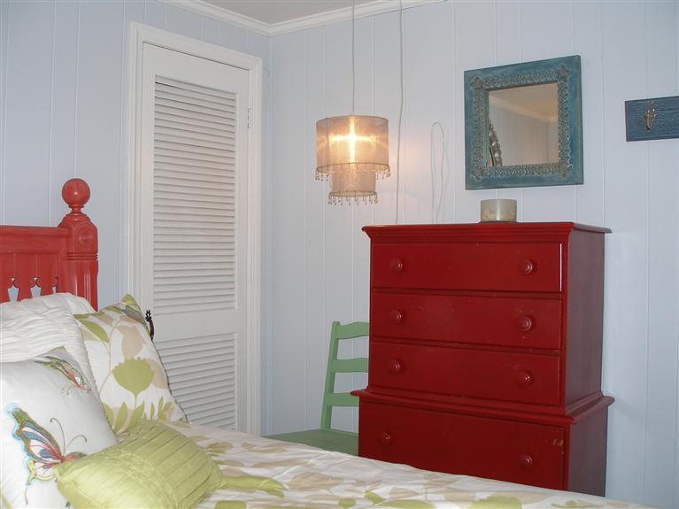 14 Paddock Pond Road Harwich, MA 02645 - Photo 21 of 28 a bedroom with a bed and a mirror