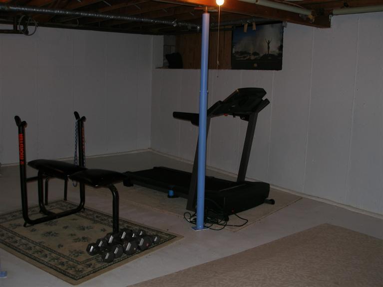 14 Paddock Pond Road Harwich, MA 02645 - Photo 27 of 28 a room with a table and chairs