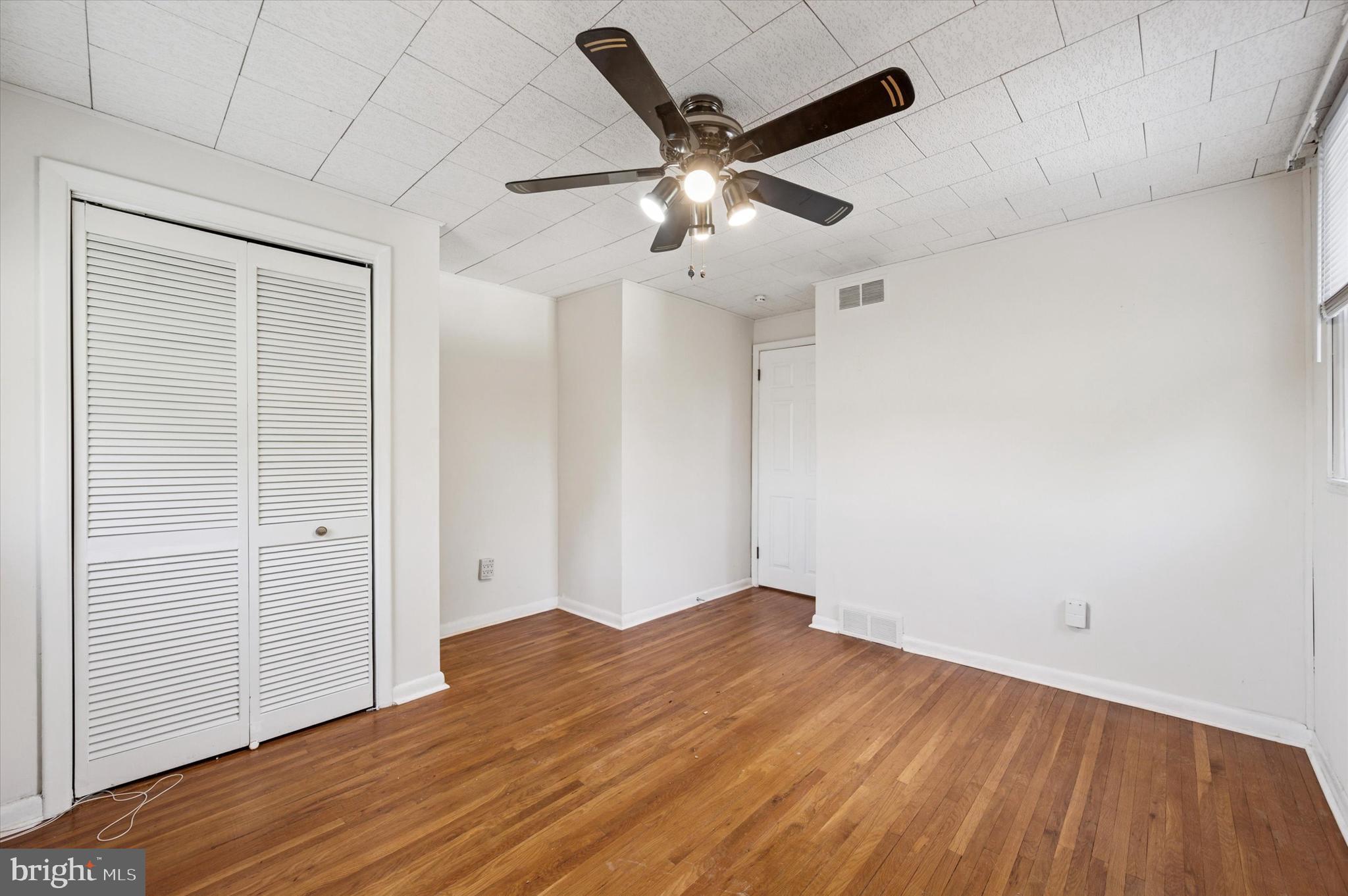708 Cambridge Road Brookhaven, PA 19015 - Photo 12 of 20 wooden floor in an empty room