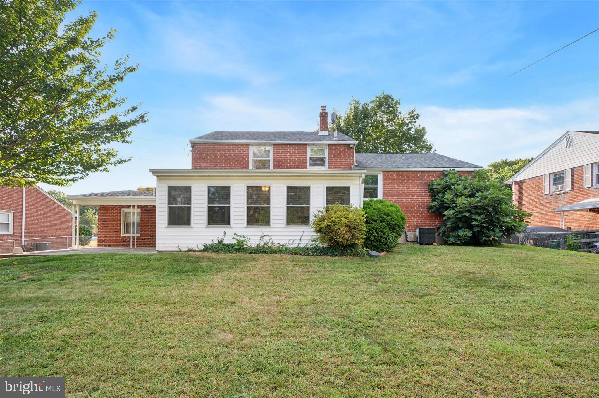 708 Cambridge Road Brookhaven, PA 19015 - Photo 18 of 20 a front view of a house with a garden