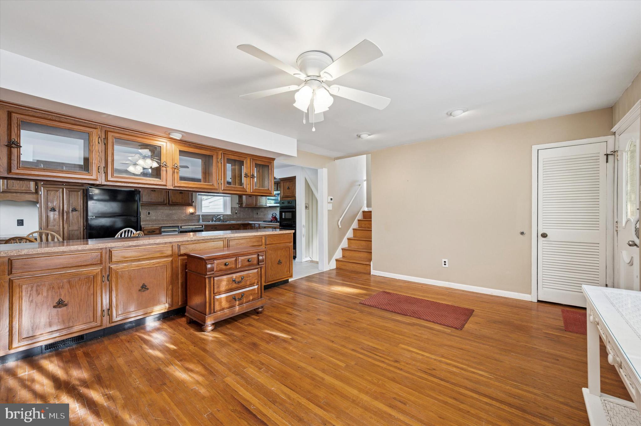 708 Cambridge Road Brookhaven, PA 19015 - Photo 4 of 20 a kitchen with stainless steel appliances granite countertop a refrigerator and a stove top oven