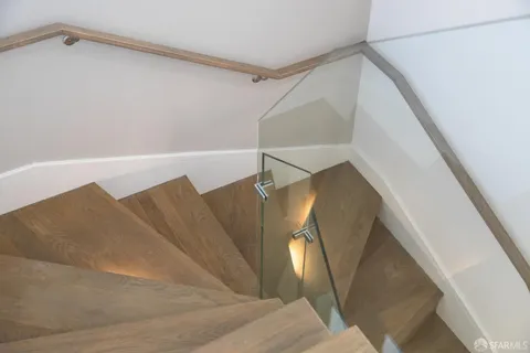 a view of entryway and kitchen