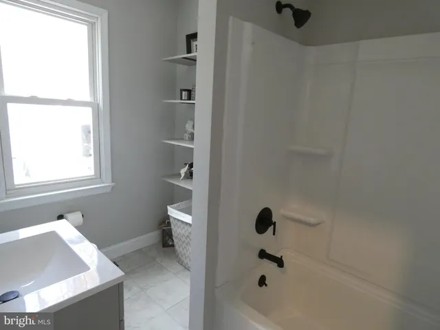 a bathroom with a bathtub